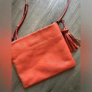 Coral orange pink crocodile the SAK cross body purse